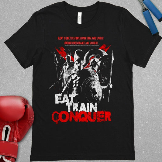 Black shirt with a design of 3 spartan warriors and the words EAT TRAIN CONQUER.