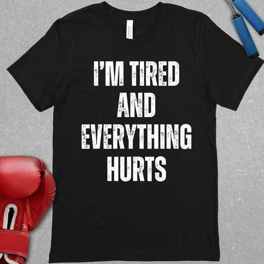 Black shirt with a design that says I’m tired and everything hurts