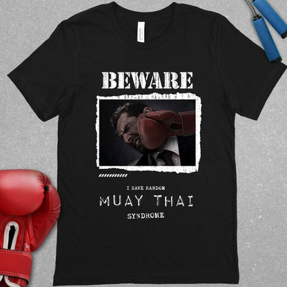 Black shirt that says "Beware I have Random Muay Thai Syndrome" and has a picture of a white collar worker being knocked by a punch.