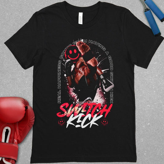 Black shirt with a design of a Muay Thai fighter throwing a switch kick with a smile on his face and the phrase around the fighter that says Real Happiness Comes From Having A Good Switch Kick.