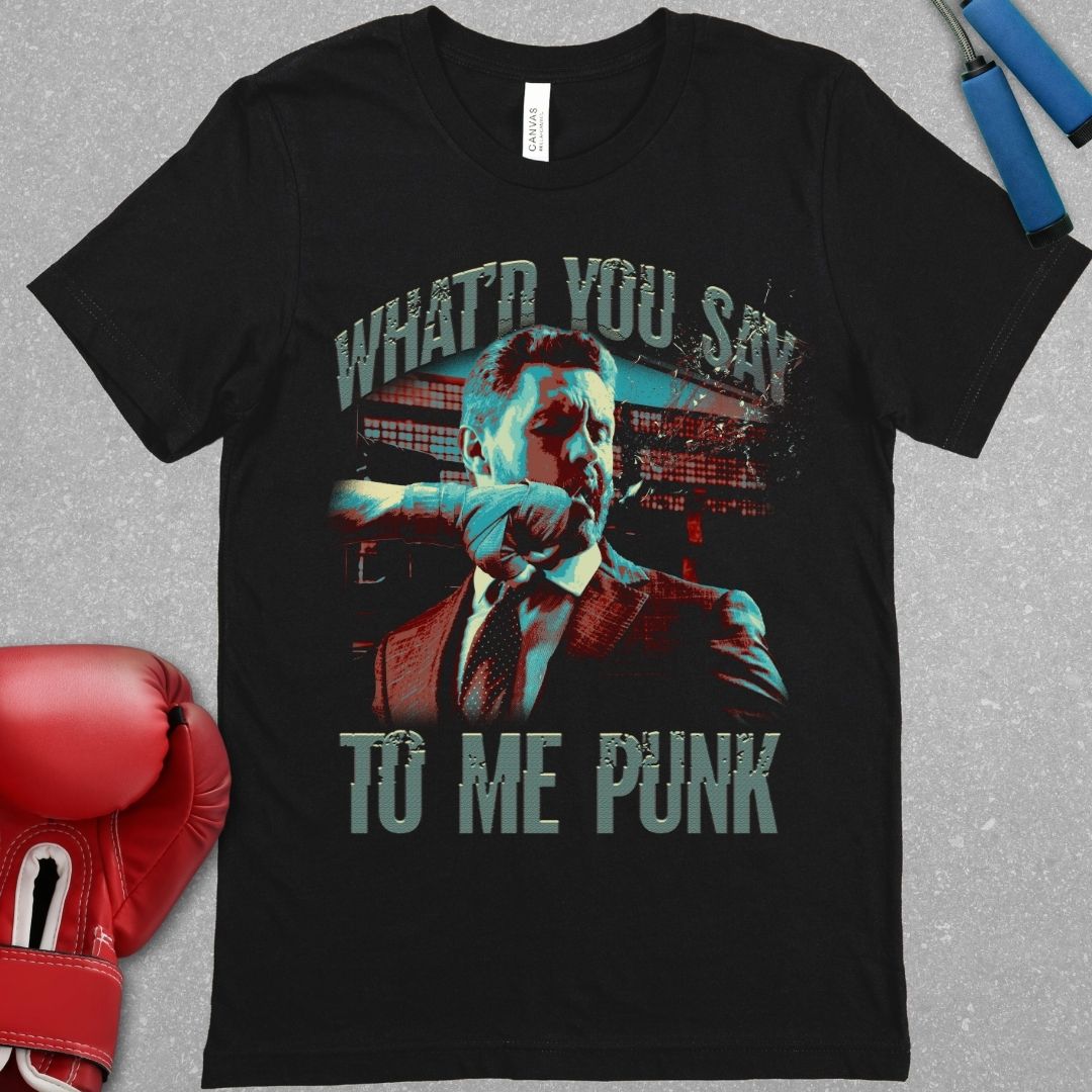 Black shirt with a design that says "What'd you say to me punk". In the design there is a picture of an office worker being punched.